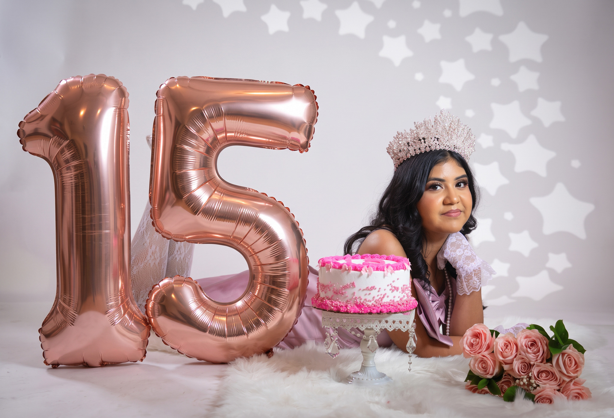 Kailah beside number fifteen balloons